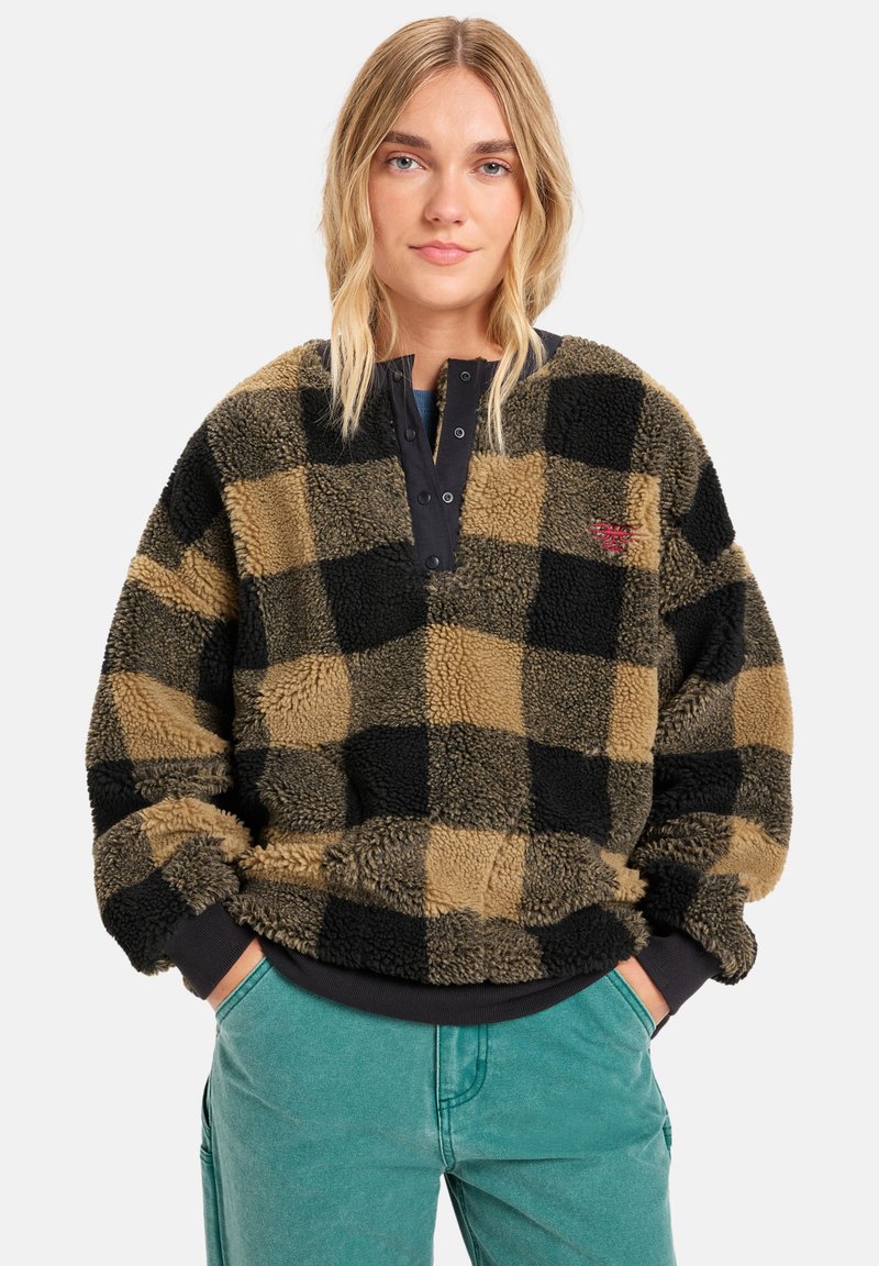 Fleece pullover in zwart en bruin geruit patroon, met een zwarte drukknoopsluiting en ribgebreide manchetten, met een gestructureerde, zachte afwerking.