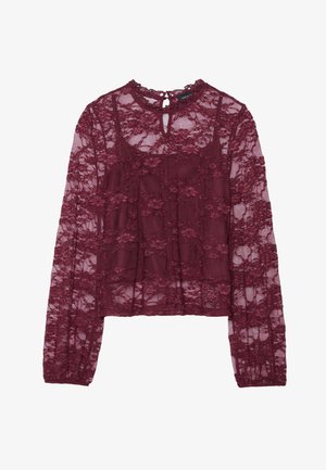 Blusa in pizzo borgogna con maniche lunghe, motivo floreale, scollatura a chiave e design a strati. Tessuto morbido e trasparente con dettagli testurizzati.