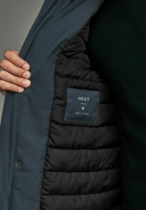SHOWER RESISTANT POCKET-REGULAR FIT - Parka - navy blue