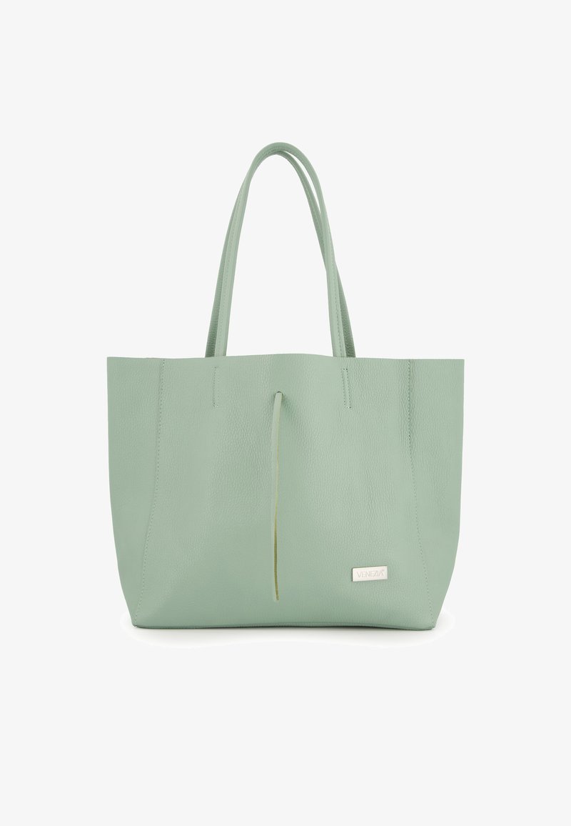 Mintgroene leren tote bag met twee lange handvatten, gestructureerd oppervlak en een eenvoudiger ontwerp. Bevat een decoratieve leren accent met een strik.