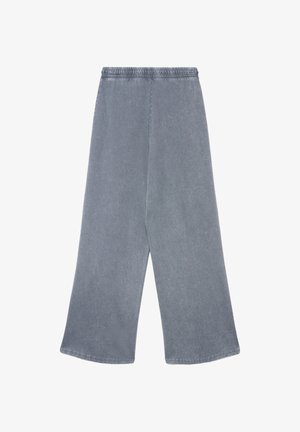 Grau weite Hose mit elastischem Bund. Hergestellt aus weichem Stoff mit subtiler Textur und sauberen Säumen. Keine sichtbaren Taschen.