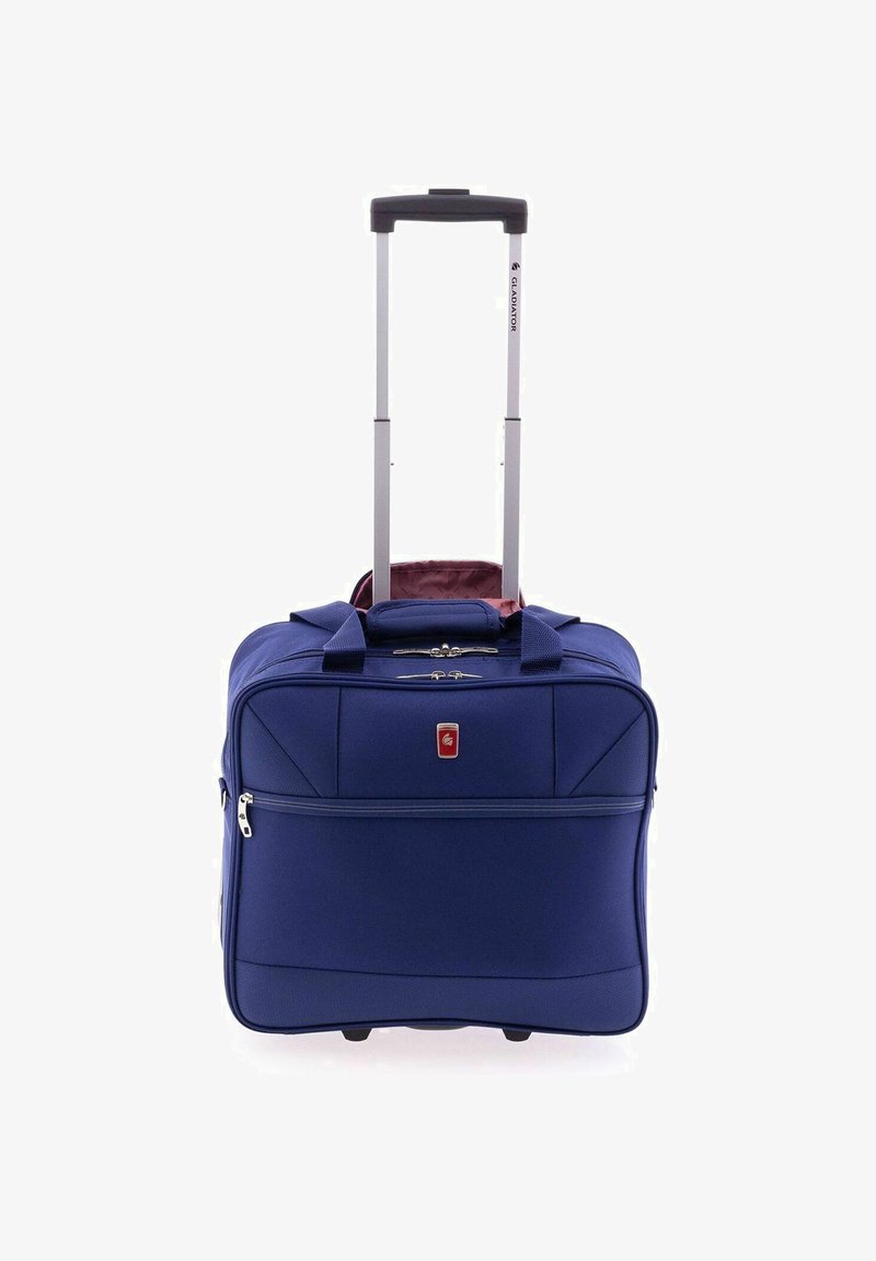 Valigia blu con ruote e manico estraibile, scomparti con zip e un rivestimento interno bordeaux a contrasto. Realizzata in tessuto resistente.