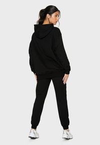 SQUATPROOF SP LEFT COMFY ACTIVE PUMP COVER  - Jersey con capucha - black