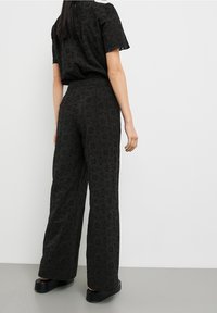 Taifun Tygbyxor - black