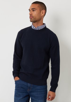 Stickad tröja - navy