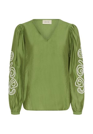 Groene blouse met lange mouwen, V-hals, opgeblazen mouwen en witte spiraalborduursels op beide mouwen.