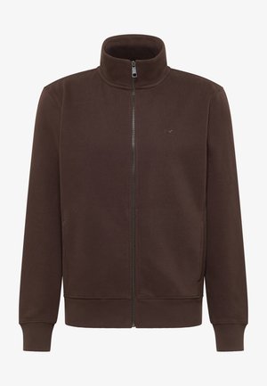 Brązowa bluza rozpinana na zamek z wysokim kołnierzem, wykonana z miękkiego materiału. Posiada boczne kieszenie oraz ściągacze przy rękawach i u dołu. Dyskretne logo po lewej stronie na piersi.