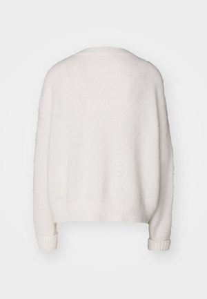 White, fluffy pullover sweater with a relaxed fit, ribbed cuffs, and hem. Smooth texture with no visible fastenings or patterns.