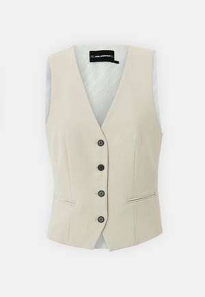 Beige vest med V-hals design, fem sorte knapper og sidelommer. Glat tekstur og skræddersyet pasform. Logo detalje på forsiden.