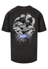 Sort oversized t-shirt med grafik af to stenfigurer, med blå accenter og lynmotiver på bagsiden.