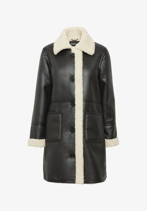 Black leather coat featuring a plush cream-colored shearling collar, matching trim, and two front pockets, with front button closure.