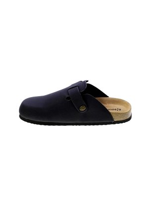 Zoccolo nero slip-on con cinturino regolabile e soletta in sughero, suola piatta nera e punta chiusa arrotondata.
