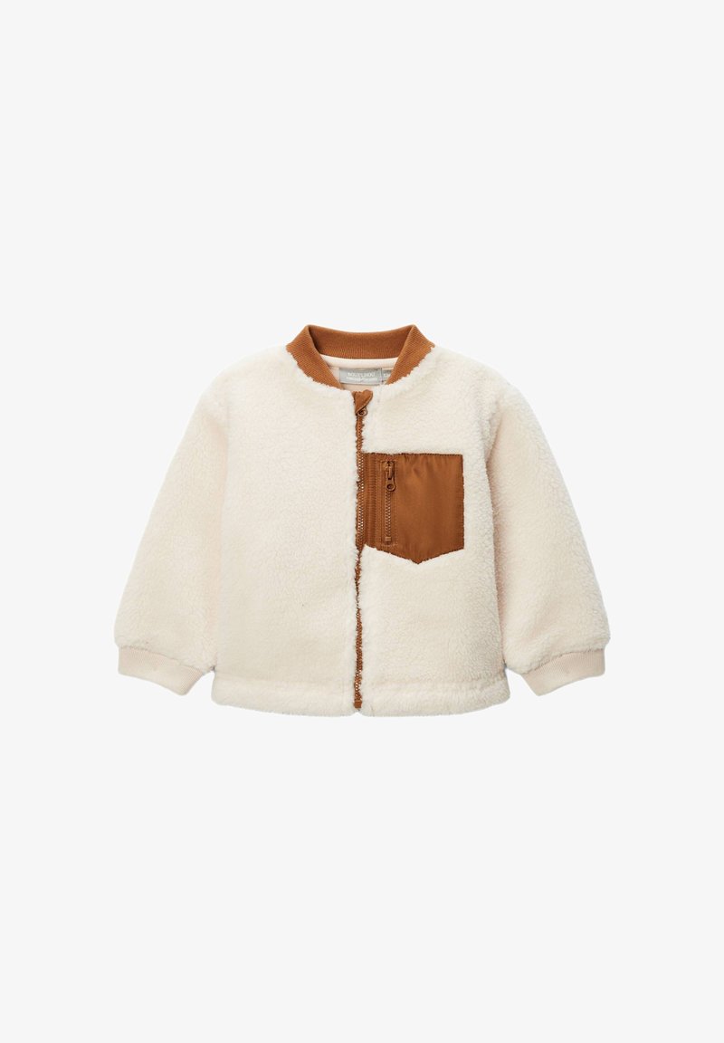 Veste en polaire, crème avec une poche en nylon marron, col rond, fermeture éclair avant, poignets élastiques et ourlet ; texture douce et design décontracté.