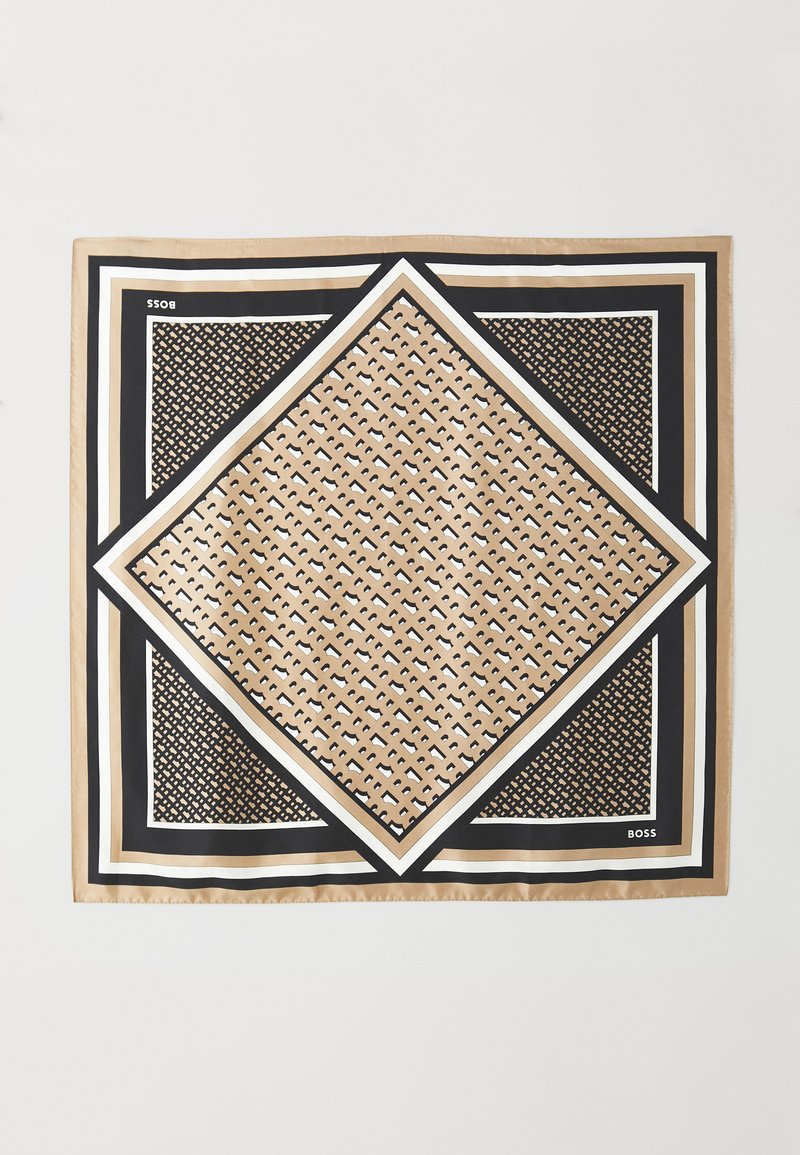 Square silk scarf featuring a geometric diamond pattern in tan and black, framed by bold white and black borders. Text on corner reads "BOSS."