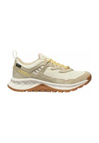 Beige Sportschuh aus Mesh- und Wildledermaterialien, mit gelben Akzenten, strukturiertem Schuhsohle und gepolsterter Zwischensohle. Verfügt über eine Zuglasche.