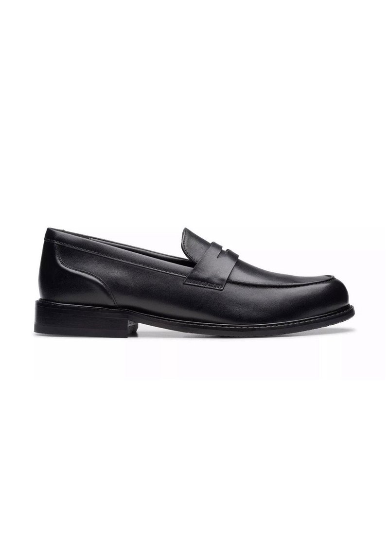 Mocassins en cuir noir au design épuré, à bout rond avec des coutures discrètes. Talon plat, texture lisse et sans métal apparent.
