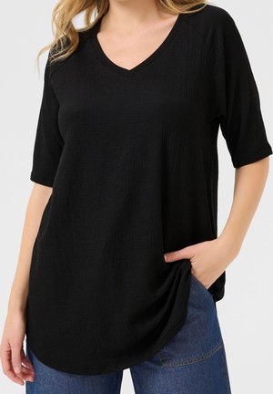 Zwarte V-hals top met korte mouwen, gemaakt van textuurstof. Het ontwerp heeft een losse pasvorm en een gebogen zoom, geschikt voor casual draag.