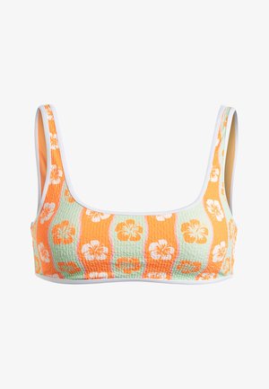 Podprsenka z textúrovaného materiálu v oranžovom, zelenom a bielom kvetinovom vzore. Má široké ramienka a biely lem pozdĺž okrajov.