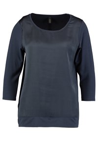 Damen langärmliges Oberteil in Marineblau mit einem glatten, satinartigen Vorderteil und Rundhalsausschnitt.