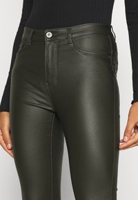 JDY NEWTHUNDER HIGH NOOS - Calças - forest night