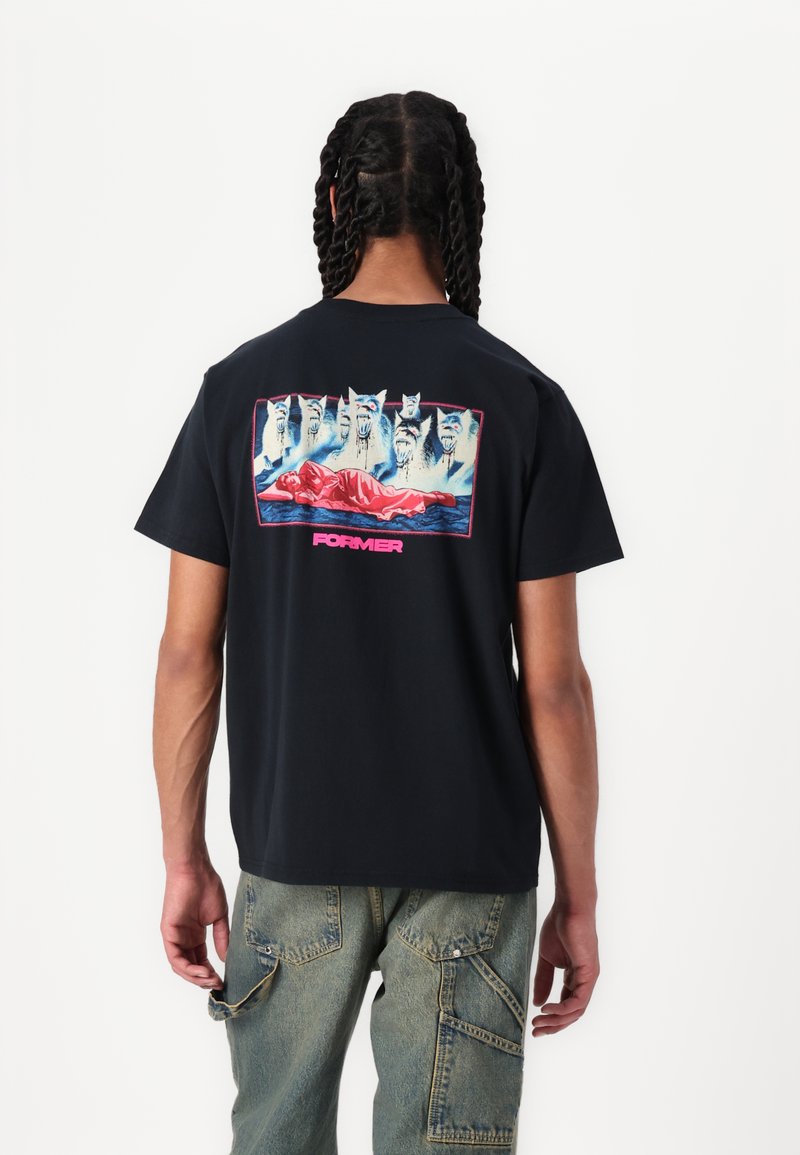 Black cotton t-shirt featuring a graphic print of cats and a figure in red on the back, with "FORMER" text in pink at the bottom.