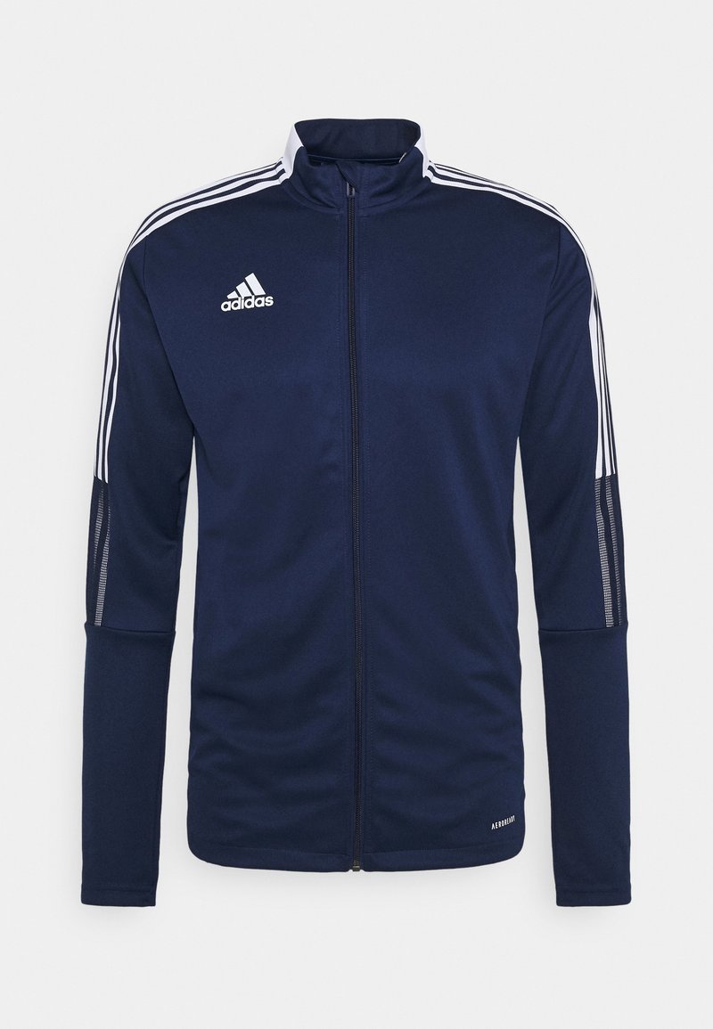 Navy athletic jacket with full zipper, high collar, and three white stripes on sleeves. Made of smooth, lightweight fabric; features Adidas logo.