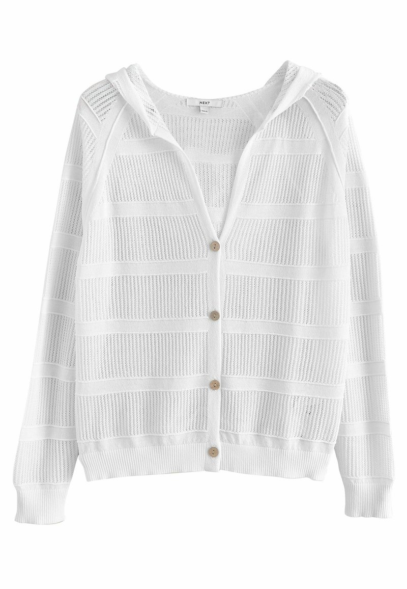 Cardigan blanc en maille avec capuche, rayures horizontales ajourées et quatre boutons beige sur le devant.