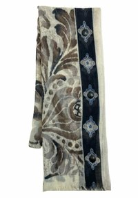 Écharpe à motifs en tissu doux, présentant un design floral beige et marron, bordé d'un accent géométrique bleu foncé et bleu clair.