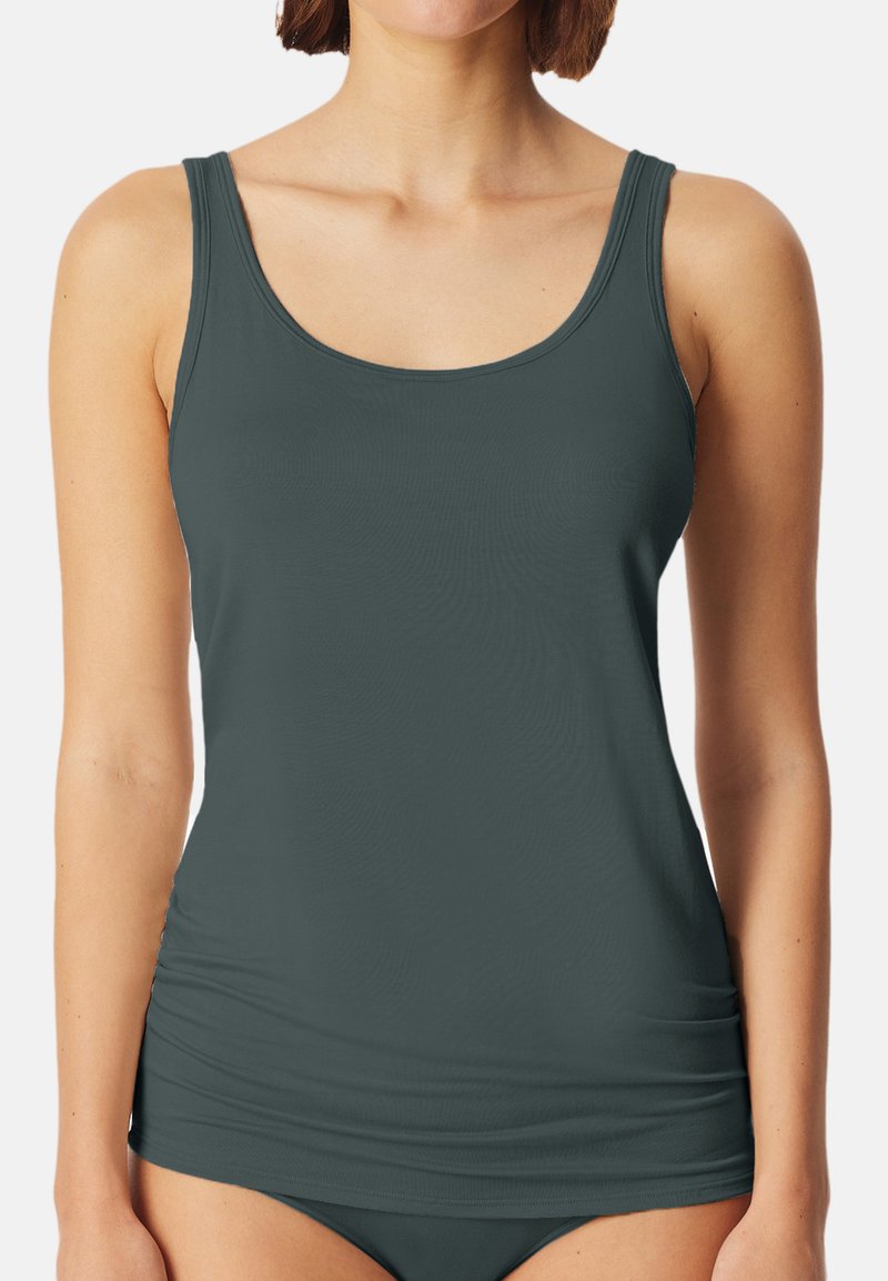 Top in teal scuro realizzato in tessuto morbido, con spalline larghe e una silhouette aderente con lievi arricciature ai lati.