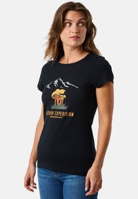 Black cotton t-shirt featuring a mountain and tree graphic in yellow and green, with "Outdoor Expedition" text. Short sleeves, fitted cut.