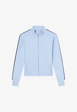 Chaqueta azul claro con cremallera, con rayas negras a lo largo de las mangas, puños acanalados, dos bolsillos frontales y pequeño logo blanco de Champion en el pecho.