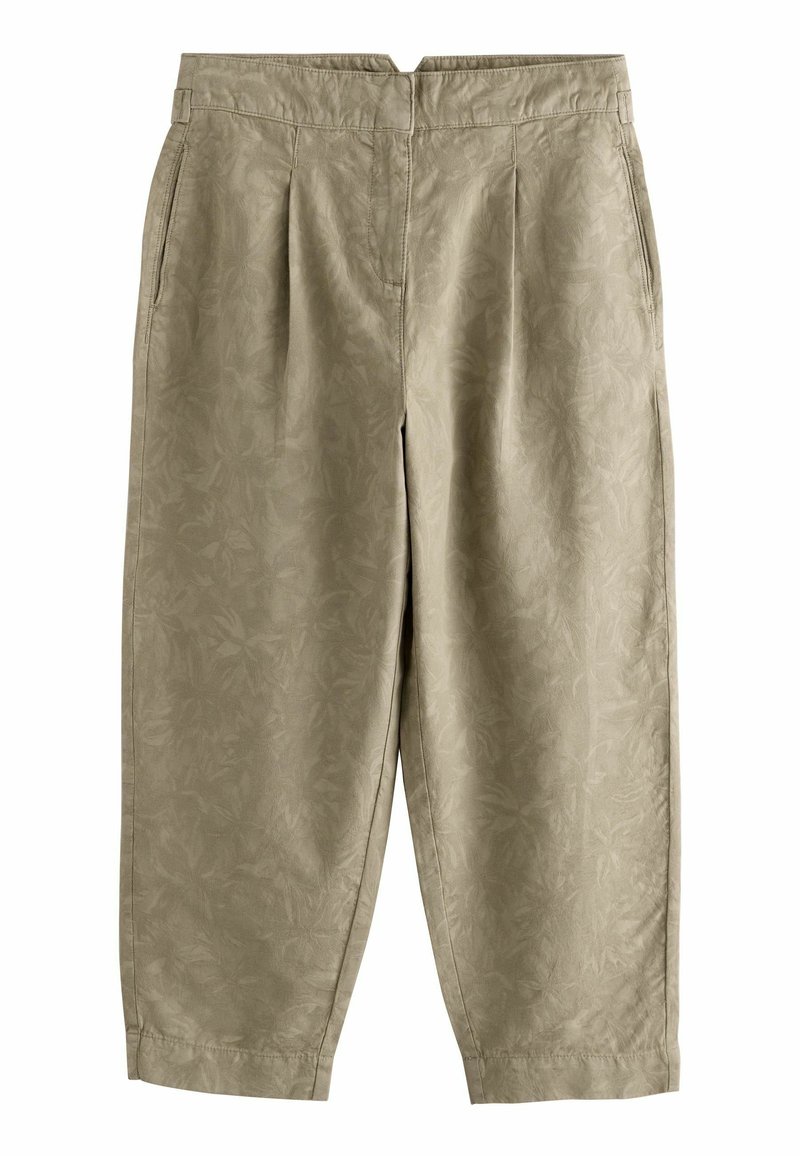 Ljusbeige, strukturerade byxor med ett subtilt bladmönster, plisserad front och sidofickor. Korta i längden och med elastisk midja.