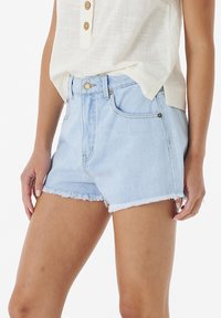 Light blue denim shorts with a frayed hem, high waist, and five-pocket design. Features a front button closure and belt loops.