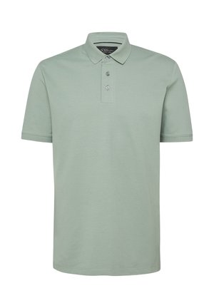 Hellgrünes, kurzärmeliges Poloshirt mit Kragen und drei Knöpfen vorne, aus weichem Baumwollstoff und mit einem schwarzen Etikett innen am Kragen.