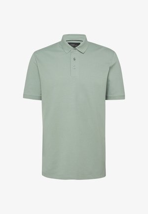 Jasnozielona koszulka polo z krótkim rękawem, kołnierzykiem i trzema guzikami z przodu, wykonana z miękkiej bawełny, z czarną metką wewnątrz kołnierzyka.