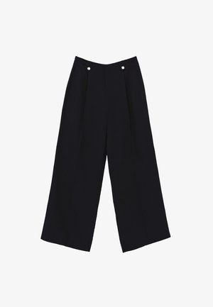 Spodnie o szerokich nogawkach w ciemnonawowym materiale, z dwoma plisami z przodu, dwoma ozdobnymi guzikami w talii oraz gładką teksturą.