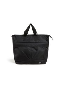 Sac fourre-tout en nylon noir avec doubles poignées supérieures, fermeture éclair et poche avant. Il présente une texture lisse et le logo Vans sur le côté.
