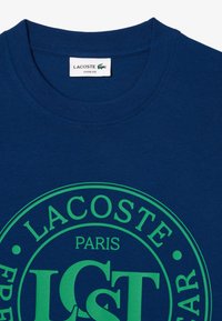 Lacoste Camiseta estampada - bleu hbm