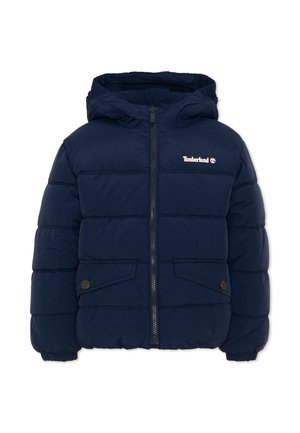 Marineblauwe doorgestikte jas met capuchon, ritssluiting aan de voorkant, twee voorzakken met knopen, elastische manchetten en Timberland-logo op de borst.