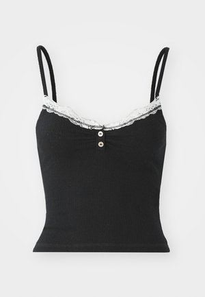 Must mustribaline tank top õhukeste rihmadega, millel on pitsiga ääristatud kaelus ja dekoratiivsed nööbid ees. Pehme tekstuur.