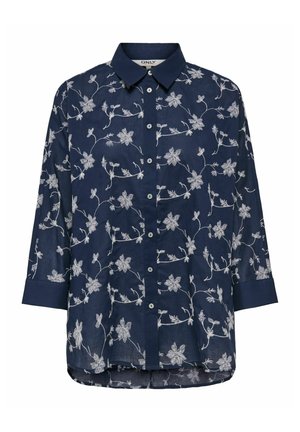 Granatowa bluzka z długim rękawem z białym kwiatowym haftem, zapinana na guziki z przodu, z kołnierzykiem koszulowym i lekko zaokrąglonym dołem.