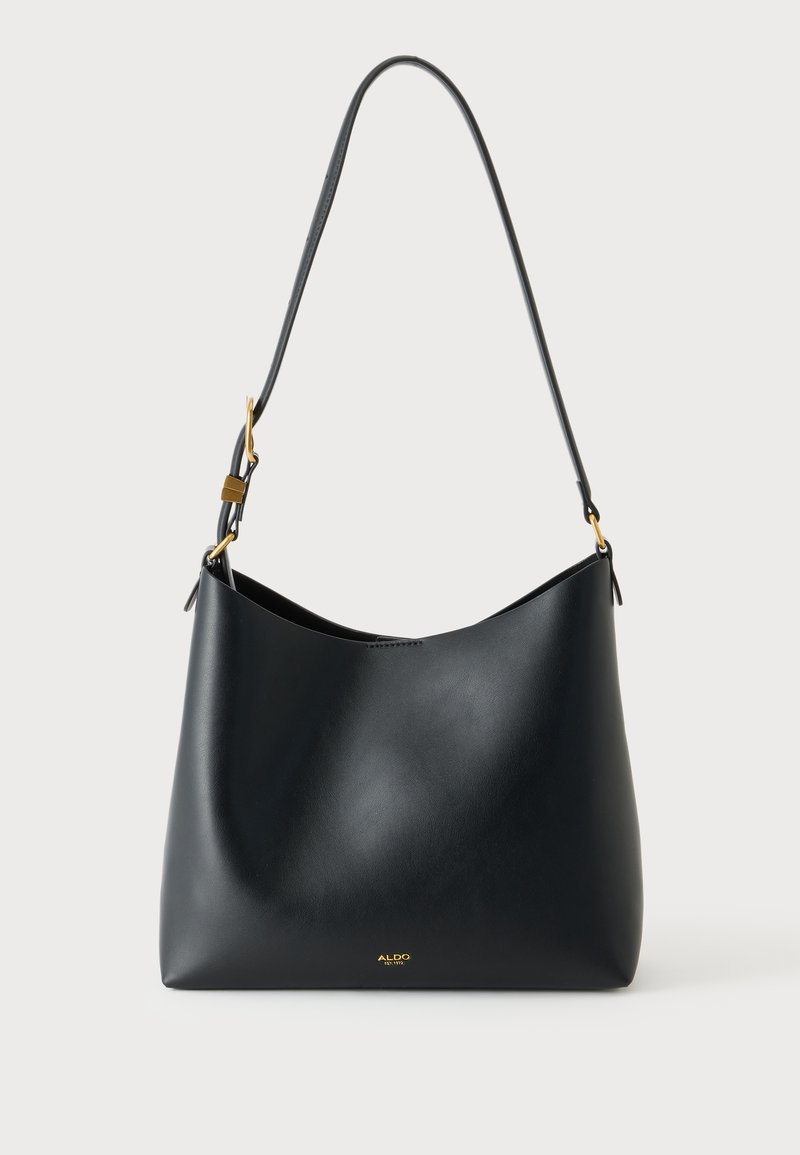 Sac bandoulière en cuir noir avec une sangle réglable et un petit logo doré Aldo à l'avant, posé sur un fond clair uni.