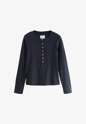 Donkerblauw langemouwen henley-shirt van ribstof, met een ronde halslijn en een knoopsluiting met beige knopen aan de voorkant.