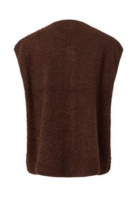 Brun, strukturerad ärmlös väst i mjukt, fluffigt tyg med rundad halsringning. Kanterna är avslutade med en kontrasterande kant.