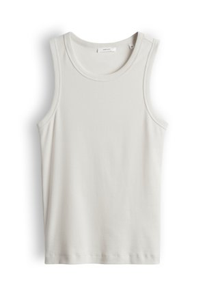 Canottiera bianca a coste senza maniche con scollo rotondo, etichetta taglia 36, distesa su sfondo bianco.