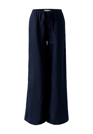 Pantalon large bleu marine avec taille élastique et cordon de serrage à l'avant, fabriqué en tissu léger, présenté sur fond blanc.