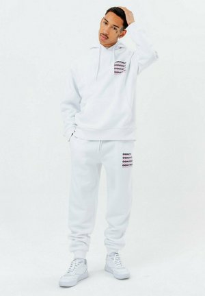 CONTINU8 - CONTINU21119 - Pantalones deportivos - white/pink/black
