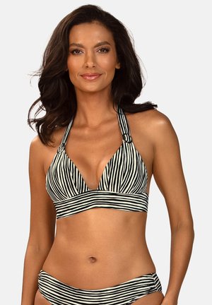 Kobieta o średnim odcieniu skóry, ubrana w czarno-biały bikini z paskami, z wiązaniem na szyi, oraz pasujące dołu, na jednolitym jasnym tle.