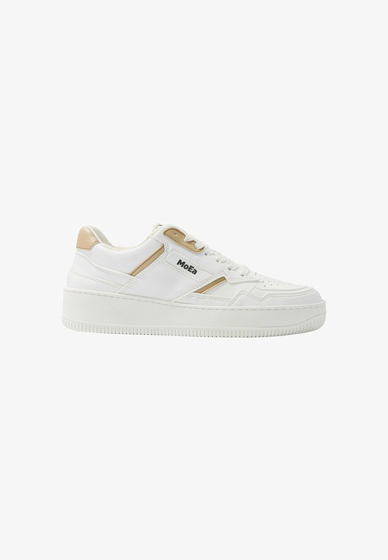 White sneaker with beige accents, made of smooth synthetic material. Features a thick rubber sole, lace closure, and logo detail on side.