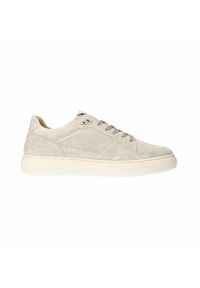 Beige suede sneakers with a low profile, rounded toe, contrasting sole, and minimal lacing design. Features textured accents on the sides.